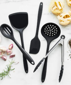 Cooking with heat-resistant silicone kitchen utensil in non-stick pan