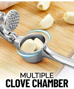 Using garlic mincer to crush fresh ginger pieces easily